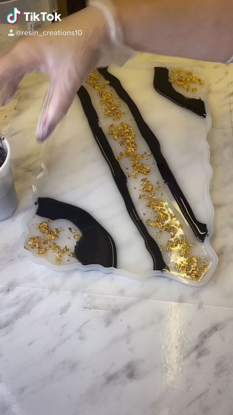 resin_creations1 on Instagram: 2 days work into 30 seconds 🤟 I’m loving this black and gold tray! Black And Gold Resin Tray, Black Resin Tray, Black And White Resin Tray, Gold Tray, Black And Gold Marble, Gold Flakes, Gold Marble, Day Work, Resin Diy