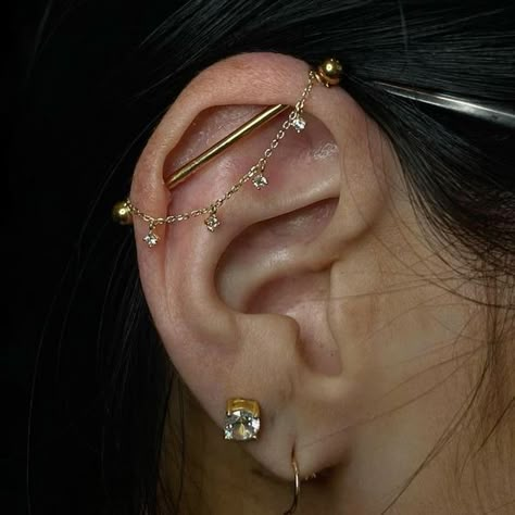 Ear Piercing Styling Gold, Good Industrial Piercing, Ear Styling Ideas Minimalist, Ear Diagram Piercings, Industrial Piercing Styling, Pretty Industrial Piercing Jewelry, Unique Ear Piercings Creative, Daith And Conch Piercing Combination, Ear Mapping Piercing Minimalist