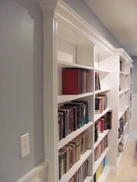 basement rec room with recessed built-in bookshelf under a soffit Stair Slide, Basement Makeover, Diy Stairs, Built In Bookcase, Book Shelves, Built In Shelves, Remodel Bedroom, Finishing Basement, Basement Remodeling