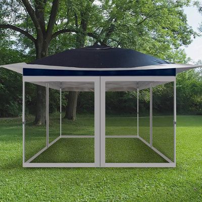 Outdoor gazebo pop-up canopy tent extra shade including sliding all around mosquito netting wall, with a durable frame, 4 sandbags, wheeled bag - easy set-up and folding commercial instant canopy for patio or camping or deck or garden. Roof Color: Navy/Gray | casualstay 12 Ft. W X 12 Ft. D Steel Pop-Up Canopy Metal / Steel / Soft-top in Gray, Size 107.0 H x 144.0 W x 144.0 D in | Wayfair Steel Storage Sheds, Outdoor Gazebo, Grill Gazebo, Bubble Tent, Instant Canopy, Canopy Frame, Shelter Tent, Pop Up Canopy Tent, Gazebo Canopy