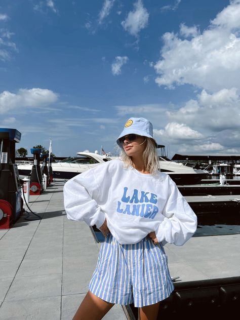 Who doesn’t love a little extra sunshine on lake Lanier! Cotton Blend White Crew Materials may have natural variations Colors may vary from different viewing devices Model wearing a size Large Comes Regular Length ☆For a cropped or distressed look add customizations to the notes section at checkout. ☆Please note: This item is a handmade item and no two items will be perfectly alike and will vary because of the dye process ☆PROCESSING & SHIPPING: Preorder Estimated Time- Ships in 1-3 weeks! Once Cold Boat Day Outfit, Beach Weekend Outfit, Cottage Outfits, Boat Day Outfit, Lake Outfit Summer, Boat Outfit, Lake Outfit, Lake Lanier, California Outfits