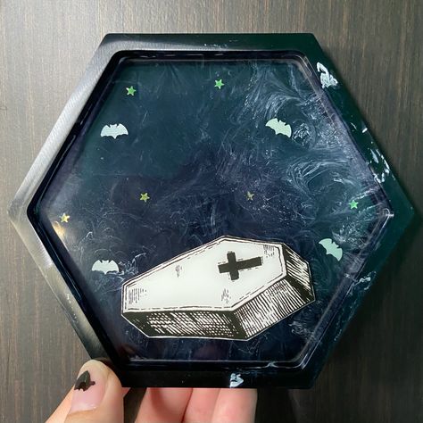 Hexagon Tray made of Epoxy Resin with marble effect and coffin, $13 at @poppyxcrafts (IG) #handmadeinsg #epoxyresin #hexagontray #halloween #coffin #gothic #creepy #marble Gothic Resin Art, Halloween Resin Ideas, Hexagon Tray, Halloween Resin, Resin Ashtray, Pink Coffin, Halloween Coffin, Bows Diy Ribbon, Resin Tray