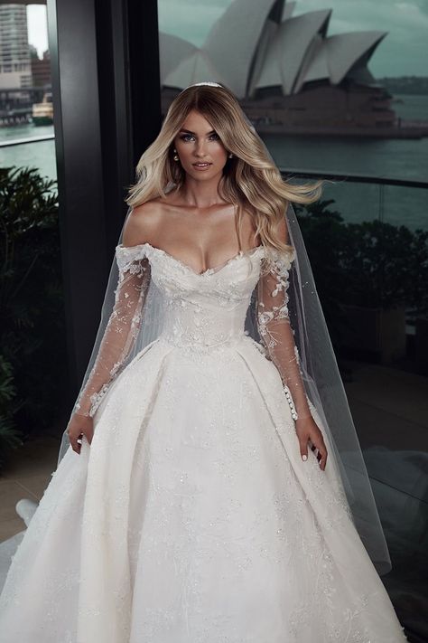 Leah Da Gloria Couture | Aura Wedding Dress | Bridal Reflections Ballgown With Sleeves Wedding Dress, Off The Shoulder Floral Wedding Dress, Leah De Gloria Wedding Dress, Fairytale Wedding Dress With Sleeves, Princess Gown Wedding Dress, Leah Da Gloria Wedding Dress, Leah Da Gloria, Wedding Fits, Bridal Reflections