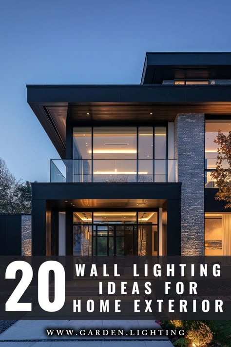 a large modern home with a lot of windows and a lot of lights