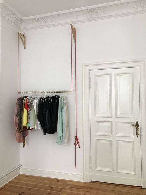 Furniture For High Ceilings, Ceiling Hanger Clothes, Ceiling Hangers Ideas, High Ceiling Closet Ideas, Ceiling Clothes Hanger, High Ceiling Bedroom Ideas Small Rooms, High Ceiling Closet Storage Ideas, High Ceiling Wardrobe, Bedroom No Closet Ideas