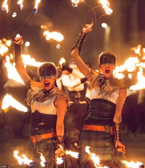 Hogmanay celebrations kick off in Edinburgh 40,000-strong torch procession | Daily Mail Online Hogmanay Traditions, Edinburgh Hogmanay, Highlands Warrior, Diversity Poster, Scotland Culture, Strong Aesthetic, People Holding Hands, Scottish Dress, Fire Fans