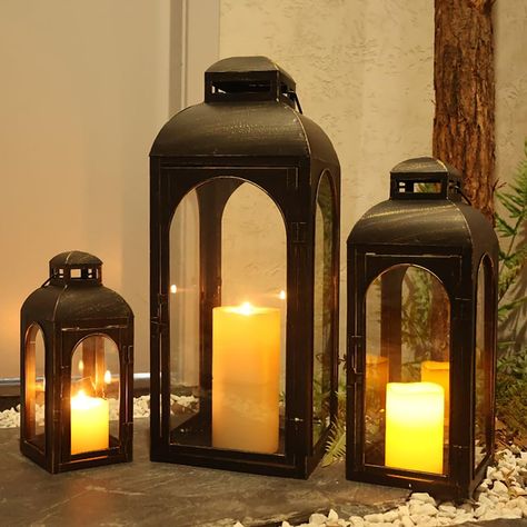 PRICES MAY VARY. Suitable for Most Outdoor Scenes——The set of 3 vintage candle lantern is perfect for outdoor use. The metal material can withstand wind and rain, while the high-quality glass prevents rainwater from getting in and allows you to see the bright, flickering candles, creating a fantastic atmosphere. Inspired Design——The combination of multiple sets adds a variety of possibilities to your home decor. The antique metal paint design combined with black and gold colors make them the per Porch Lanterns Decor, Vintage Kitchen Design, Porch Lanterns, Small Porch Decorating, Patio Pathway, Fall Patio, Small Porch, Vintage Patio, Metal Light Fixture