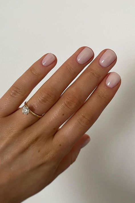 These elegantly shaped oval nails showcase a sheer pink hue that exudes a natural and refined look. The glossy finish adds a touch of sophistication, perfect for a timeless and graceful appearance. 🌸  // Photo Credit: Instagram @amyburvillnails Natural Nails For Engagement Photos, Arch Nails Design, Subtle Natural Nails, Short Rounded Nails French Tip, Oval Vs Square Nails, Nails Acrylic Square Round, Natural Nails Polish Ideas, Natural Oval Nails Short, Short Manicured Nails Natural