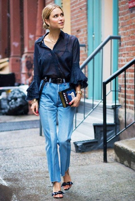 Pernille Teisbaek wears a sheer blue blouse with ruffle sleeves, paneled jeans, sandals with bow-detailing, and an Olympia le Tan book clutch | Style | The Lifestyle Edit Denim Hacks, Jeans Trend, Style Désinvolte Chic, Looks Jeans, Street Style 2016, Walking Down The Street, Street Style Blog, Paris Mode, Bootcut Jean