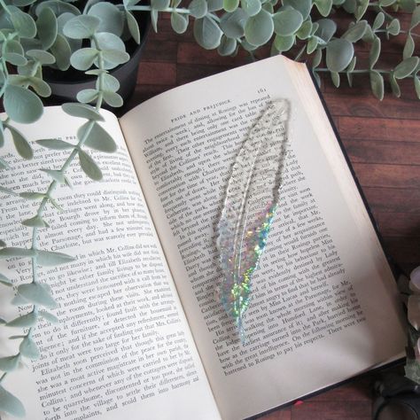 Resin Bookmarks for the book addict 😍 #indigomoon #indigomoonstudiouk #bookmark #resin #feather #bookworm #bookaddict Resin Bookmark Ideas, Emily Tattoo, Bookmark Resin, Resin Bookmarks, Resin Crafting, Feather Bookmark, Bookmark Ideas, Bookmark Craft, Resin Craft