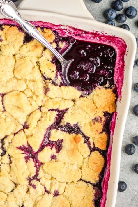 This Blueberry Cobbler is easy to make, but hard to resist. Make this cobbler recipe with frozen or fresh blueberries, and you will enjoy it  all year round! Gluten Free Blueberry Cobbler, Triple Berry Cobbler, Berry Cobbler Recipe, Blueberry Cobbler Recipes, Oatmeal Chocolate Chip Bars, Easiest Dessert, Blueberry Banana Bread, Berry Cobbler, Blackberry Cobbler