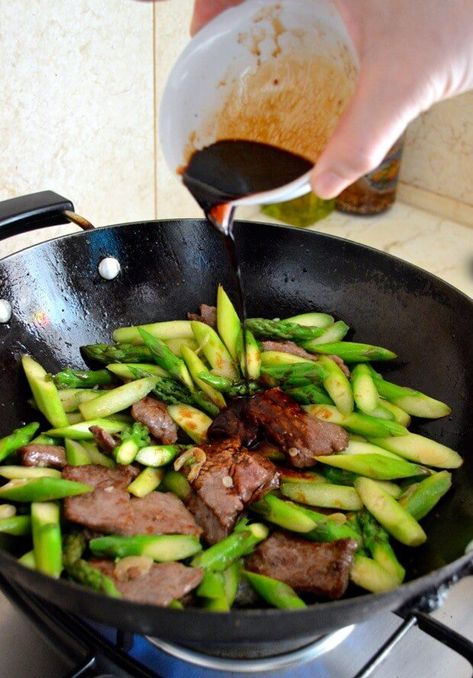 Beef asparagus stir fry is a simple and easy-to-make stir fry dish. You get a hearty beef recipe coupled with the fresh flavor of asparagus Beef Asparagus Stir Fry, Asparagus Stir Fry Recipes, Chines Food, Stir Fry Beef, Stir Fry Wok, Wedding Foods, Asparagus Stir Fry, Wok Recipes, Woks Of Life