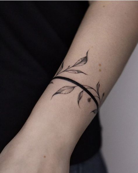 Bracelet Tattoos For Women Arm, Wrist Wrap Tattoos For Women Unique, Thigh Bracelet Tattoo, Tattoo For Wrist For Women, Leaf Arm Band Tattoo, Floral Armband Tattoo For Women, Band Tattoos Women, Delicate Wrist Tattoo, Nature Band Tattoo