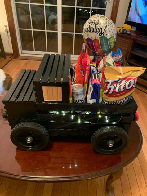 Crate Gifts Basket, Truck Made Out Of Candy, Wooden Crate Ideas For Christmas, Wooden Crate Gift Basket Ideas Christmas, Truck Stuff For Boyfriend, Crate Gift Basket Ideas For Boyfriend, Candy Truck Diy, Car Box Ideas For Kids, Wood Crate Gift Box Ideas