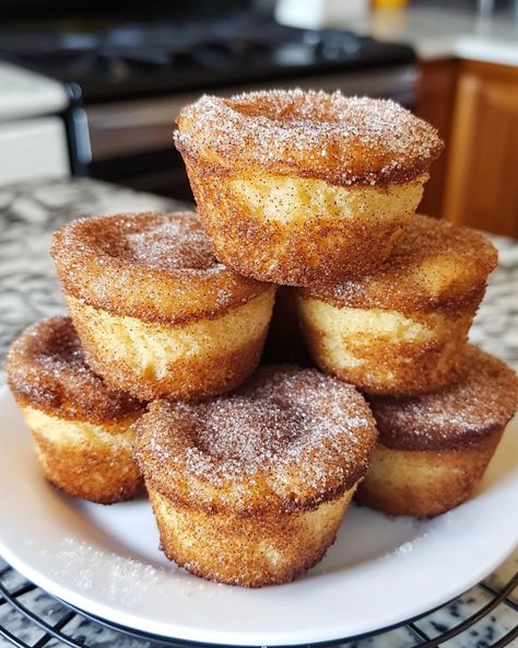 Cinnamon Sugar French Toast Muffins These Cinnamon Sugar French Toast Muffins are a delicious twist on classic French toast, baked into portable, bite-sized muffins coated in cinnamon sugar! Ingredients: - 1 ½ cups all-purpose flour - ½ cup granulated sugar - 1 tablespoon baking powder - ½ teaspoon salt - 1 teaspoon ground cinnamon - ½ teaspoon ground nutmeg - 1 cup milk - 2 large eggs - ¼ cup melted butter - 1 teaspoon vanilla extract - ½ cup cinnamon sugar (for coating) Instructions: 1.... Cinnamon Sugar French Toast Muffins, French Toast Baked, Cinnamon Sugar French Toast, French Toast Muffins, Classic French Toast, Pretty Dessert, Cinnamon Toast, Yummy Comfort Food, Edible Food