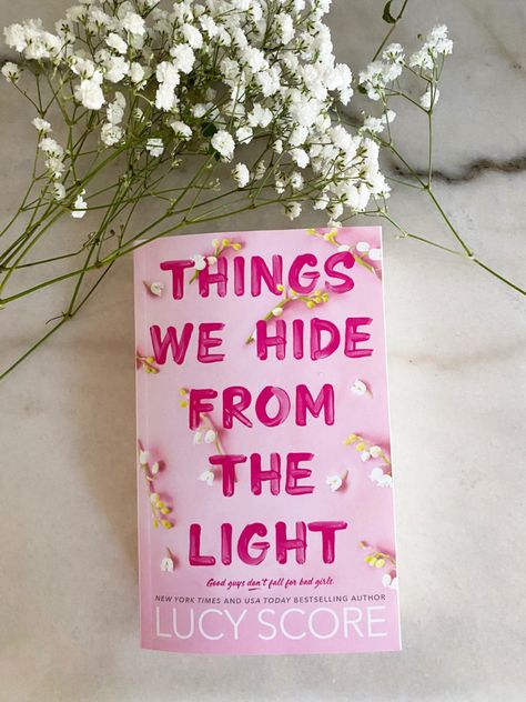 "Things We Hide from the Light" captivates with its intricate characters and a suspenseful plot woven through secrets and human vulnerabilities. The author skillfully delves into the complexities of hidden truths, making readers ponder the blurred lines between light and darkness. A compelling read that lingers in the mind. #book #ThingsWeHideFromTheLight #romance #LucyScore Lucy Score, Small Town Life, Small Town Romance, Audible Books, Famous Books, Southern Charm, Books To Buy, Book Aesthetic, Get Over It