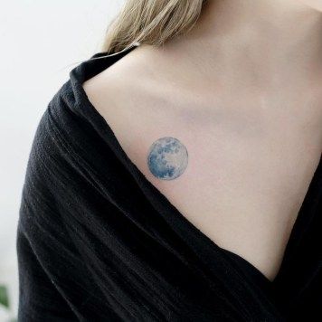 blue moon tattoo Blue Moon Tattoo Ideas, Navy Blue Tattoo, Blue Tattoo On Brown Skin, Star Tattoo On Shoulder, Blue Moon Tattoo, Miniature Tattoos, Blue Ink Tattoos, Circular Tattoo, Small Star Tattoos