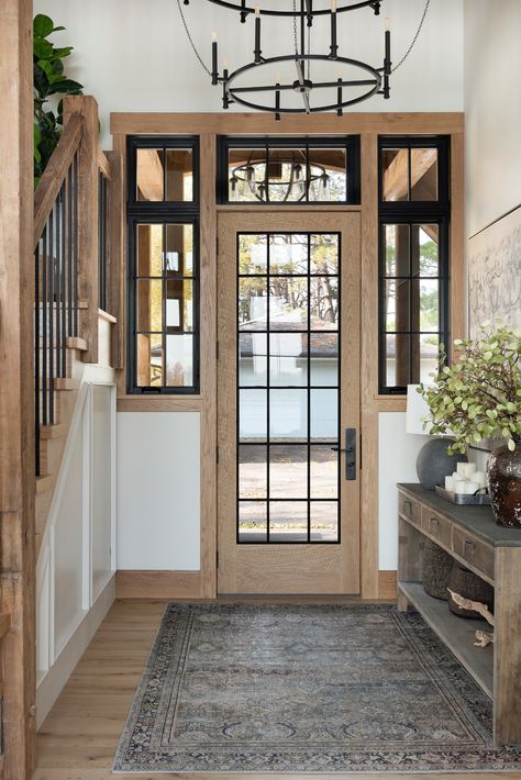 Gull Lake Home - Rustic - Entry - Minneapolis - by Tays & Co Design Studios | Houzz Trim With Black Windows, Stain Front Door, Interior Wood Trim, Rustic Entry, Gull Lake, Rustic Entryway, Cozy Breakfast Nook, Lake Home, Living Room Photos