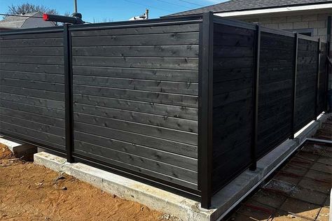 Black Privacy Fence: A Panel Kit to Build Your Fence Garage Paneling Ideas, Black Privacy Fence, Brick Veneer Panels, Pallet Barn, Split Rail Fence, Black Fence, Fence Designs, Privacy Fence Designs, Restaurant Patio