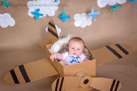 DIY Cardboard Box Plane and Photo Set - Walking Through Wonderland Cardboard Box Plane, Pilot Photoshoot, Cardboard Plane, Cardboard Airplane, Airplane Birthday Party Decorations, Pilot Baby, Airplane Theme, Baby Milestone Photos, Airplane Birthday Party