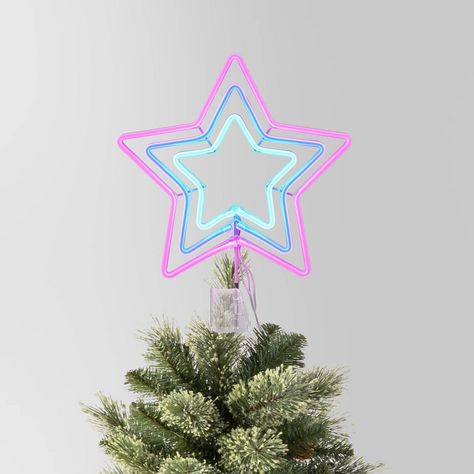 This 12.5-Inch Pre-lit LED Neon-Style 5-Point Star Christmas Tree Topper from Wondershop™ adds a bright and eye-catching finishing touch to your tree. Made from metal, this tree topper is designed as a five-pointed star with LED bulbs in neon pink and blue hues. Featuring a pre-lit design, it also has an adjustable clip for easy attachment to the top of your Christmas tree. Welcome to the Wondershop™. Christmas Tree Topper Pink, Christmas Tree Topper Red, Star Christmas Tree Topper, Star Christmas Tree, Neon Style, Star Tree Topper, Star Christmas, Neon Fashion, Christmas Tree Topper