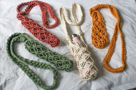 Macrame bottle holder is the perfect boho accessory. Can be used on dog walks, hiking, beach day or for everyday use! Made of 100% biodegradable eco-friendly cotton rope. The bag can be used as a cross body bag, or a handbag off one arm. It can also be used as a wine bottle holder as a gorgeous gift. Macrame Bottle Holder, Macrame Bottle, Simpul Makrame, Wine Gift Bag, Wine Bottle Holder, Dog Walks, Festival Bag, Boho Accessories, Wine Bottle Holders