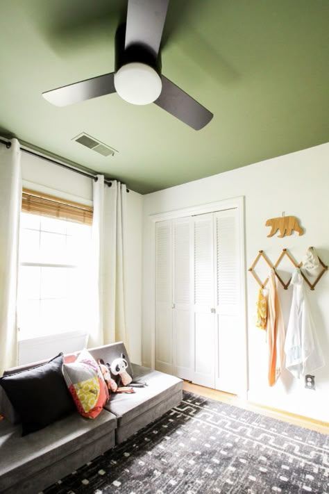 adorabel boy\'s nursery with olive green ceiling White Room Green Ceiling, Green Ceiling Bedroom Ideas, Green Accent Ceiling, Ceiling And Half Wall Paint, Light Green Ceiling Paint, Green Painted Ceiling Bedroom, Painted Green Ceiling, Olive Green Painted Walls Bedroom, White Walls Green Ceiling