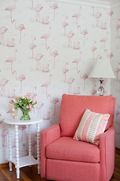 Photography: http://whatshannisaw.com | Read More: https://www.stylemepretty.com/living/2016/12/16/the-most-magical-nurseries-of-2016/ Pink Rocking Chair, Bedroom Wallpaper Accent Wall, Pink Accent Walls, Girl Nursery Wallpaper, Flamingo Nursery, Girl Nursery Pink, Girl Nursery Themes, Tropical Nursery