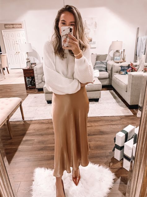 Champagne Gold Skirt Outfit, Cream Silk Top Outfit, Rose Gold Silk Skirt, Maxi Silk Skirt Outfit Winter, Satin Midi Skirt Outfit Curvy, How To Style Silk Midi Skirt, Sweater With Silk Skirt, How To Style Long Silk Skirt, Brown Silk Midi Skirt Outfit