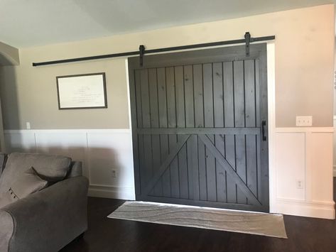 Barn Doors Over Sliding Glass Doors, Office Closet Door, Barn Door Basement, Door In Living Room, Sherwin Williams Black, Door For Living Room, Barn Door In House, Farmhouse Bathroom Accessories, Barnyard Door