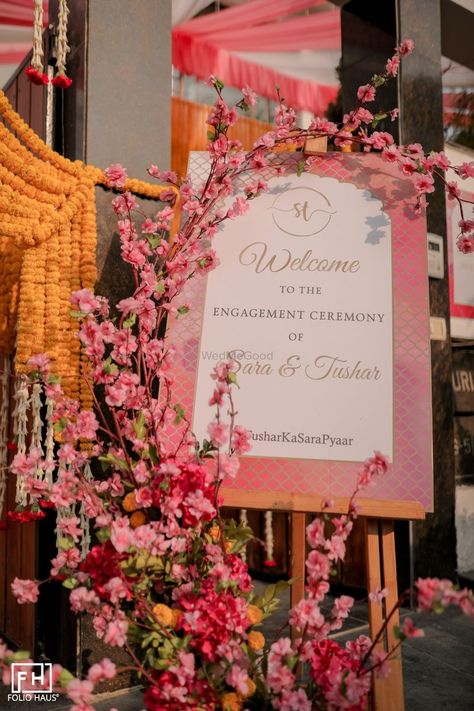 Welcome Standee For Haldi, Engagement Standee Design, Engagement Welcome Board Ideas, Engagement Signage, Hinge App, Engagement Setup, Couple Frame, Floral Wedding Decor, Welcome Signage