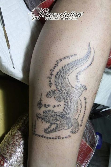 Sak yant crocodile tattoo at forever tattoo chiang mai. Great job, awesome tattoo studio. Crocodile Tattoo, Forever Tattoo, Sak Yant Tattoo, Awesome Tattoo, Sak Yant, Great Job, Chiang Mai, Tattoo Studio, Infinity Tattoo