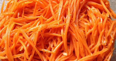 Russian "Korean carrot" salad is a marinated salad with fresh carrot as the main ingredient. The dressing is a simple vinaigrette spiked w... Korean Carrot Salad, Korean Carrot, Marinated Salad, Michigan Food, Carrot Salad Recipes, Simple Vinaigrette, Carrot Salad, Shredded Carrot, Russian Recipes