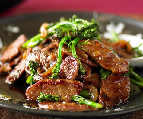 Very thinly sliced lamb works best for this delicious Mongolian stir-fry by Woman's Day. Freeze it almost all of the way, then use a super sharp knife to slice the pieces before using. Mongolian Lamb Recipe, Lamb Stir Fry, Lamb Steaks, Lamb Recipe, Bean Sauce, Mongolian Lamb, Lamb Dishes, Wine Vinegar, Rice Wine