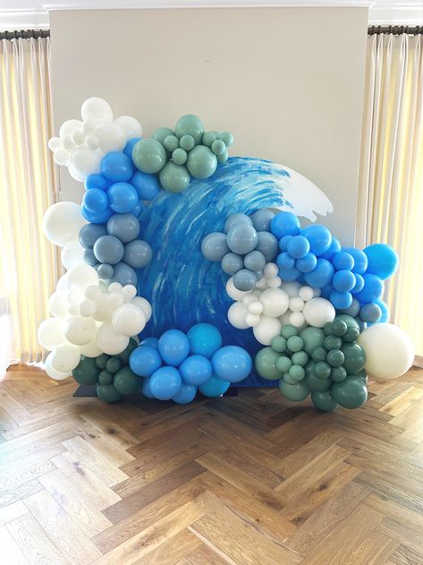 Custom made wave with blue, green and white balloons for a Catch a Wave theme Bat Mitzvah Wave Balloon Garland, Balloon Wave Arch, Wave Theme Party, Beach Balloon Garland, Wave Balloon Arch, Beach Theme Balloon Arch, Beach Balloon Decorations, Wave Balloons, Beach Balloon Arch