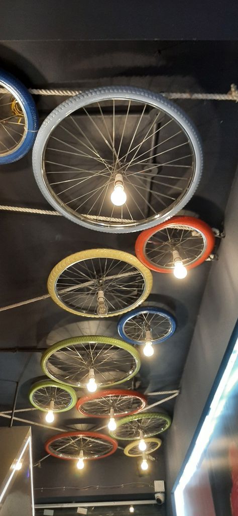 Bike Shop Interior Design, Cycle Store Design, Bike Wheel Art, Bicycle Room, Bicycle Wall Art, Tire Art, Backyard Fireplace, Wheel Decor, Idea Room