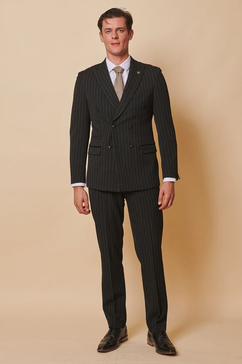 Meet our all new double breasted style, in classic black pinstripe. This exquisite double-breasted two-piece suit combines the timelessness of pinstripes with the sophistication of a tailored fit. The ultimate in luxurious fashion, Rocco is the perfect choice for an elegant look. Model wears size 40R blazer & 34R trousers. Features Slim fit Peak lapel Single back vent Four button cuff Double-breasted blazer fastening Complimentary pocket square Functional inside and outside pockets to the blazer Pinstripe Double Breasted Suit Men, Pinstripe Suit Wedding, Men Blazer Style, Single Breasted Suit Men, Suits Combinations Men, British Suits Men, Graduation Suit Men, Double Breasted Wedding Suit, Double Breasted Pinstripe Suit