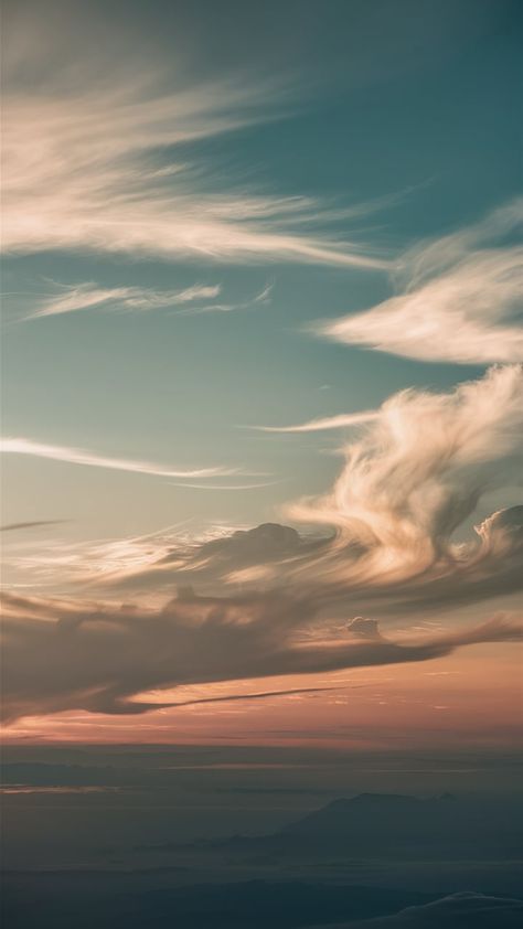 Immerse yourself in a breathtaking dawn scene where pastel hues blend into deep blues and vibrant oranges. This Impressionistic sky wallpaper captures light and shadow as the sun rises, with wispy clouds reflecting serene colors. Experience a touch of surrealism as the sky swirls in dreamlike patterns, evoking tranquility and freedom. Perfect for adding beauty to your space. #SkyWallpaper #Dawn #Impressionism #Serenity Wispy Clouds, Ethereal Blue, The Sun Rises, Sky Wallpaper, Sun Rises, A Sky, Pastel Hues, Vibrant Orange, Light And Shadow