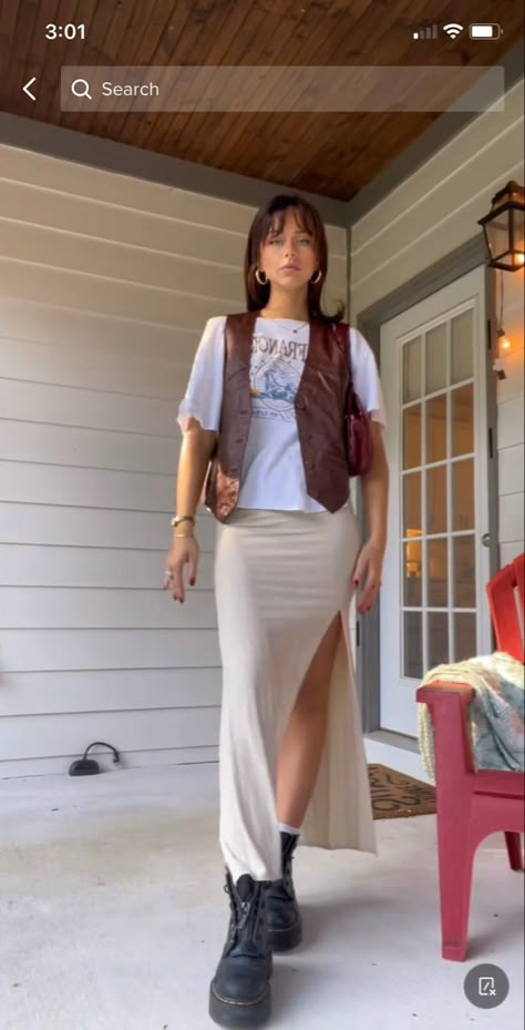 Womens Cream Dress, Women’s Leather Vest Outfit, White Boot Outfit Summer, White Leather Vest Outfit, Leather Vest With Dress, Leather Vest Outfits For Women Fall, Vest Midi Skirt Outfit, Preppy Street Style Summer, Hippy Going Out Outfits