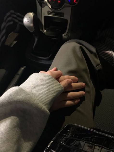 Holding Hands In The Car Aesthetic, Car Hand Holding Couple, Car Cuddling Couples, Car Love Aesthetic, Couples Driving Car, Couple Car Ride Aesthetic, Car Holding Hands Aesthetic, Couple Holding Hands In Car At Night, Car Cuddles Couples