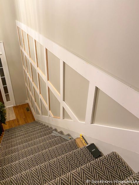 Batten Board Stairwell, Board And Batten On Sloped Wall, Box Moulding Stairs, Wall Panelling On Stairs, Half Wall Cap Ideas, Shiplap On Stair Wall, Stair Board And Batten, Stairway Board And Batten, Stairs With Walls On Both Sides