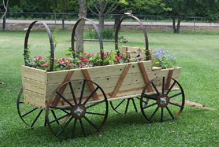 Chuck Wagons Wagon Planter, Windmill Decor, Metal Windmill, Old Wagons, Chuck Wagon, Industrial Dining Table, Flower Cart, Flower Gardens, Plant Stands