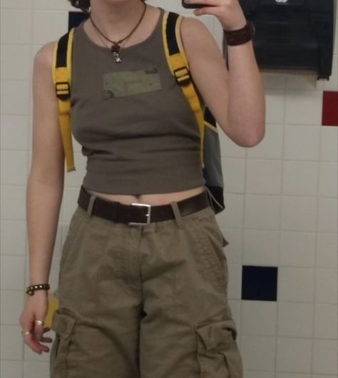 Green And Brown Summer Outfit, Green Cargo Shorts Outfit Aesthetic, Yellow Backpack Outfit, Green Cargo Shorts Outfits Women, Muscle Tank Outfit Women, Tan Cargo Shorts Outfit, Beige Cargo Shorts Outfit, Brown Cargo Shorts Outfit, Khaki Cargo Shorts Outfit