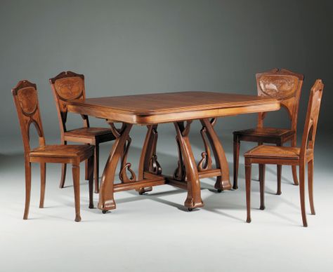 AN ART NOUVEAU CARVED DINING TABLE AND SIX CHAIRS ENSUITE  DESIGNED BY LEON BENOUVILLE, CIRCA 1895 Art Nouveau Dining Table, Carved Dining Table, Ensuite Design, Nouveau Furniture, Art Nouveau Furniture, Dining Table And Chairs, Large Image, Deco Furniture, Art Deco Furniture