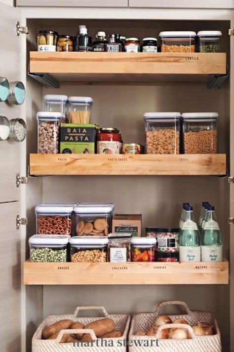 An organized pantry is a must. Sort your groceries and store them in food-safe containers for easy access later. Adding pullout drawers to your pantry creates added function, so you or your kids won't have to go rummaging through shelves. #marthastewart #organization #cleaninghacks #kitchentips #kitchenorganizationideas Small Kitchen Pantry, Organiser Cucina, Space Saving Shelves, Interior Boho, Desain Pantry, Pantry Shelving, Small Kitchen Organization, Small Kitchen Storage, Small Pantry