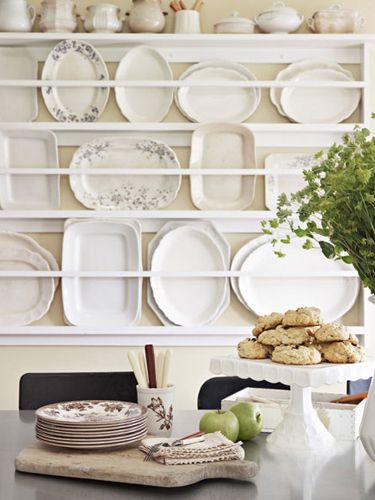 Make an artful asset of hard-to-store goods; this custom rack displays the oversize dishes. Plate Racks In Kitchen, White Platter, Kitchen Plate, Pretty Plates, French Kitchen, White Dishes, Plate Racks, French Country Cottage, Displaying Collections