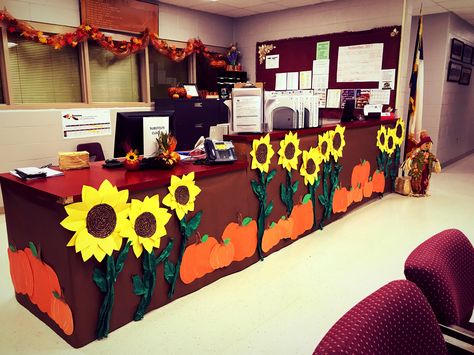 Fall office decor. Sunflowers and pumpkins. School decor. Fall Work Decorations, Fall Work Office Decor, Fall Cubical Decor, Work Fall Decorations, September Office Decor, School Secretary Office Decorating Ideas, Fall School Decorating Ideas, Fall Decor For Nursing Home, Fall School Door Decorating Ideas Office