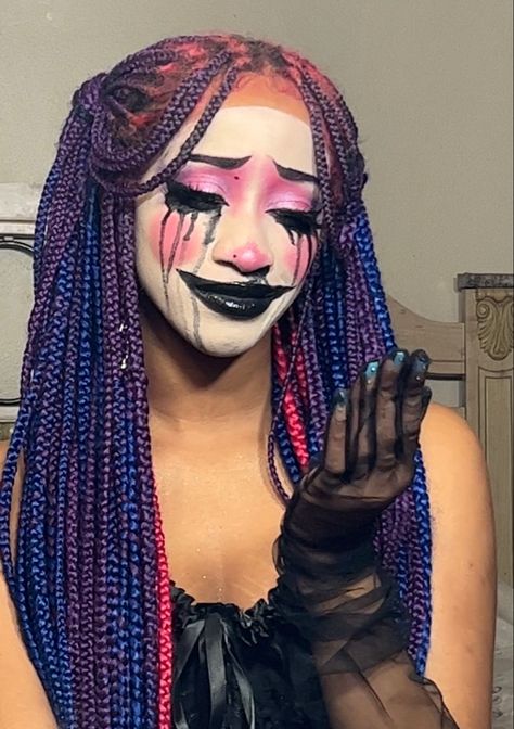 Clown core makeup for Halloween on black girl with colorful braids  
Clown makeup Crazy Makeup Looks Halloween, Crazy Make Up Looks Full Face, Dream Core Makeup, Clown Core Makeup Black, Joker Women Makeup, Clown Makeup Inspo Colorful, Clown Core Drawing, Dark Clowncore Makeup, Messy Clown Makeup