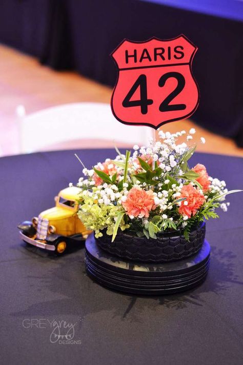 Route 42 Vintage Car Party | CatchMyParty.com Car Theme Graduation Party, Motorcycle Centerpiece Ideas, Muscle Car Party, Cars Trucks Birthday Party, Hot Rod Wedding, Car Themed Wedding, Car Centerpieces, Vintage Race Car Birthday, Vintage Car Birthday