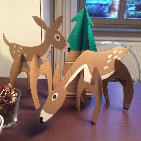 Wonderful Animal Crafts using Cardboard. - Best Out of Waste Crafts Using Cardboard, Christmas Cabin Decor, Jungle Theme Decorations, Diy Christmas Village Displays, Cardboard Animals, Grinch Christmas Decorations, Diy Christmas Village, Christmas Props, Christmas Concert